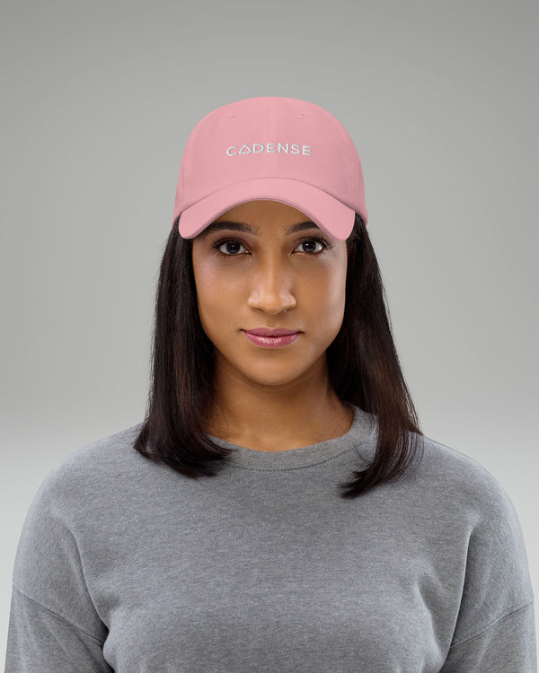 Female wearing Pink baseball hat