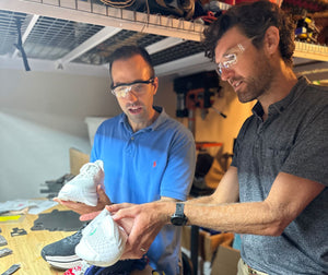 Dr. Tyler Susko and Dr. Elliot Hawkes reviewing Cadense adaptive shoes