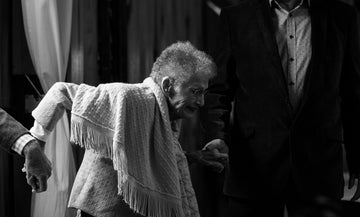 Elderly woman with pain when standing