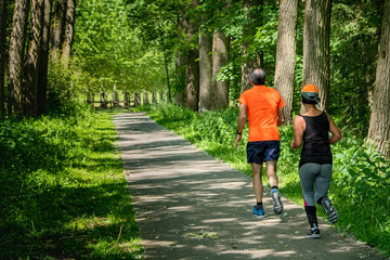 a couple jogging in nature
