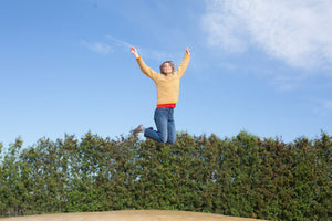 Woman jumping in the air