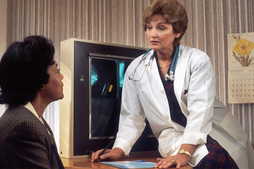 woman receiving a health exam