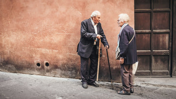 Elderly man and woman talking