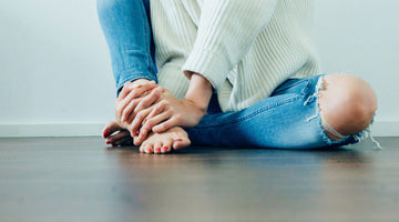 Woman sitting on the floor