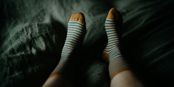 Person's feet with striped socks