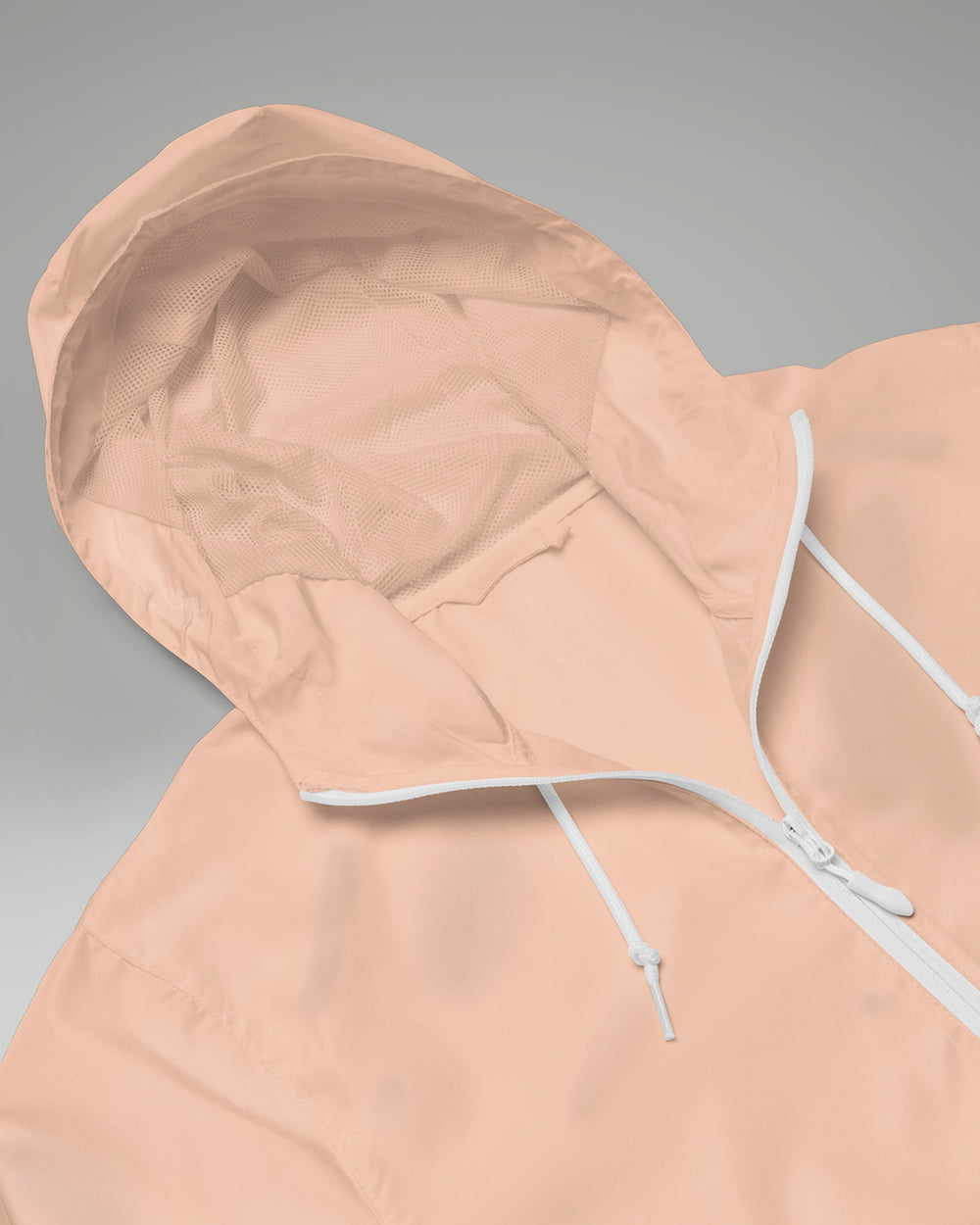 [color: blush] Hood of blush-colored Cadense Airwave Windbreaker.