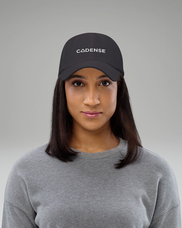 Female wearing Dark grey baseball hat