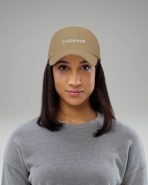 Female wearing Khaki baseball hat