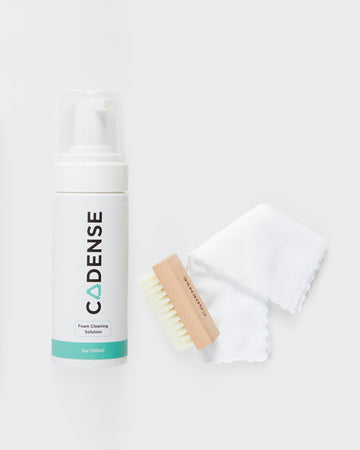 Foam cleaning solution, brush, and washcloth included in the Cadense Cleaning Kit 