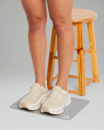 woman standing on the transition mat 
