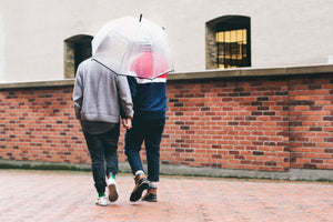 Couple walking in the rain