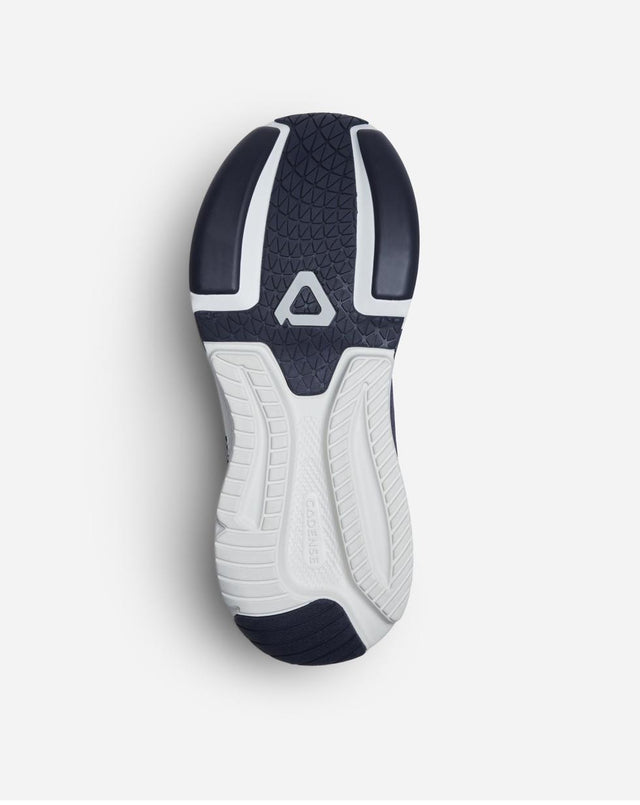 Top-down view of the Cadense sole showing the grip zone, glide zones, and transition foam